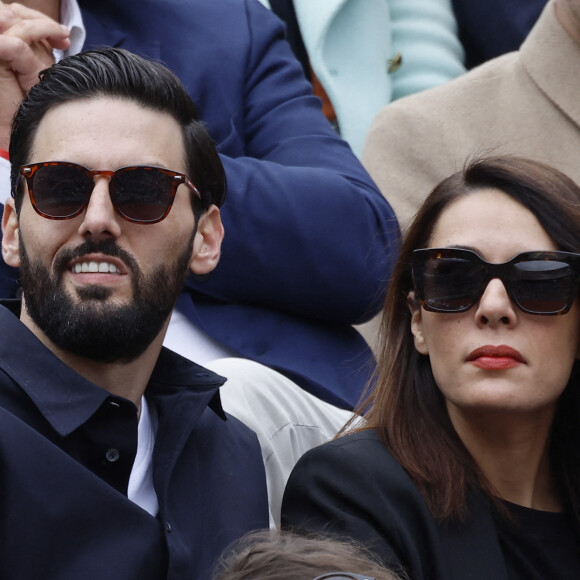 Sofia Essaïdi et son compagnon Adrien Galo - People dans les tribunes lors des Internationaux de France de Tennis de Roland Garros 2022 à Paris le 29 mai 2022. © Cyril Moreau/Bestimage.
