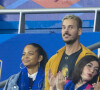 M. Pokora (Matt Pokora), sa femme Christina Milian assistent au match de la 5ème et avant-dernière journée de Ligue des nations entre la France et l'Autriche (2-0) au Stade de France à Saint-Denis le 22 septembre 2022.