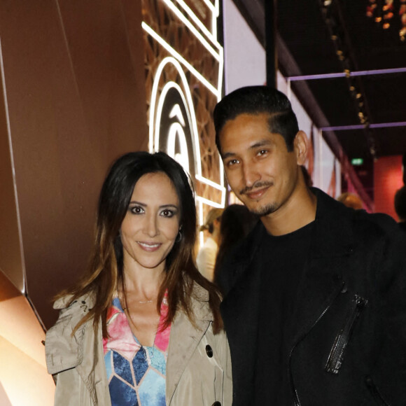 Semi Exclusif - Fabienne Carat, Sami Nouri - Arrivées à la soirée "Lancôme x Orlinski" pour le lancement d'une capsule collector à Paris le 20 octobre 2022. La rose emblématique de Lancôme revisitée par l'un des grands noms de l'art contemporain. Tel est le propos autour de la nouvelle capsule conçue par la marque de cosmétiques en partenariat avec R.Orlinski, connu pour ses sculptures animalières. © Marc Ausset Lacroix / Christophe Clovis / Bestimage