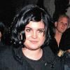 La métamorphose de Kelly Osbourne : En août 2005, Kelly Osbourne et très ronde, brune mais affiche un sourire charmant ! 