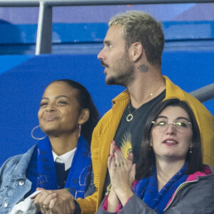 M. Pokora (Matt Pokora), sa femme Christina Milian assistent au match de la 5ème et avant-dernière journée de Ligue des nations entre la France et l'Autriche (2-0) au Stade de France à Saint-Denis le 22 septembre 2022. 