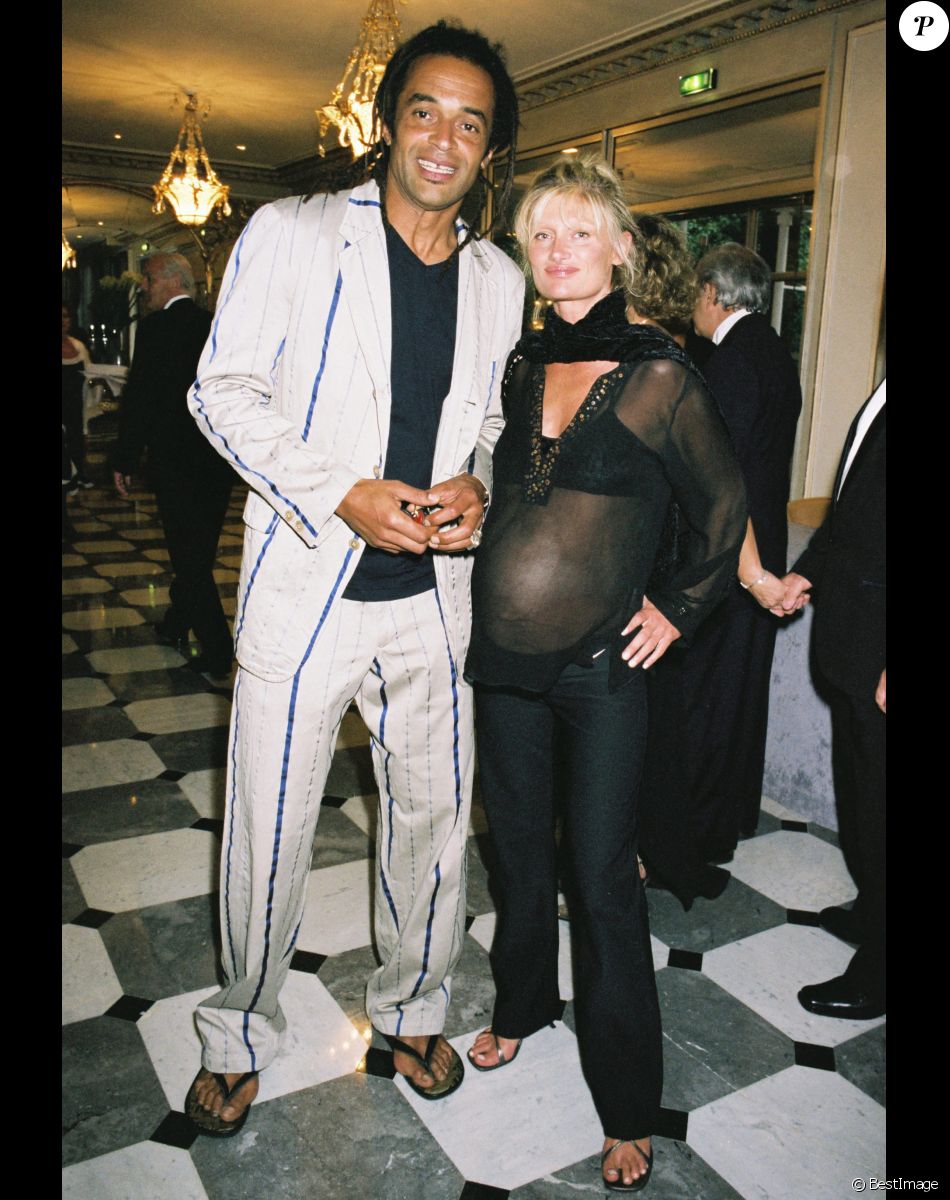 Yannick Noah et sa compagne Isabelle Camus (enceinte de leur fils Joalukas), à Paris en 2004.