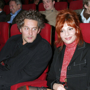 Mylène Farmer et Laurent Boutonnat lors de la première du film "Les Choristes" à Paris.