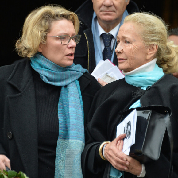 Exclusif - Brigitte Fossey, sa fille Marie Adam et son mari Yves Samama aux obsèques de Marcelle Feuillade ( mère de Brigitte Fossey) en l'Eglise de Notre Dame de Boulogne Billancourt le 23 décembre 2016.