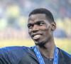 Paul Pogba avec sa mère Yeo et ses frères Florentin Pogba et Mathias Pogba - L'équipe de France célèbre son deuxième titre de Champion du Monde sur la pelouse du stade Loujniki après leur victoire sur la Croatie (4-2) en finale de la Coupe du Monde 2018 (FIFA World Cup Russia2018), le 15 juillet 2018. 