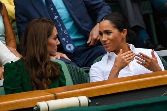 Archives - Catherine (Kate) Middleton, duchesse de Cambridge, Meghan Markle, duchesse de Sussex, sont dans les tribunes lors de la finale femme de Wimbledon "Serena Williams - Simona Halep (2/6 - 2/6) à Londres le 13 juillet 2019. © Chryslène Caillaud / Panoramic / Bestimage 