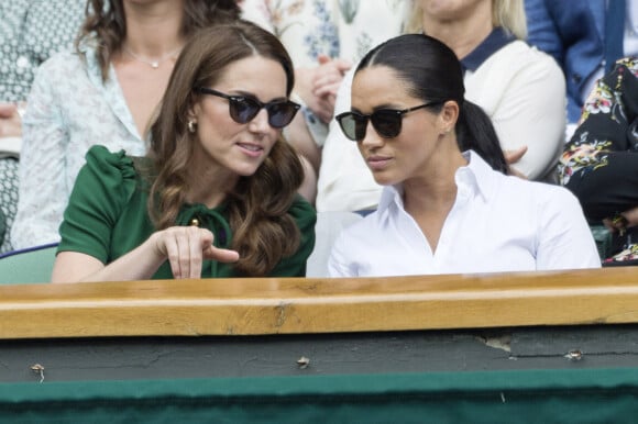 Catherine (Kate) Middleton, duchesse de Cambridge, Meghan Markle, duchesse de Sussex, et Pippa Middleton dans les tribunes lors de la finale femme de Wimbledon "Serena Williams - Simona Halep (2/6 - 2/6) à Londres, le 13 juillet 2019. © Ray Tang/London News Pictures via Zuma Press/Bestimage