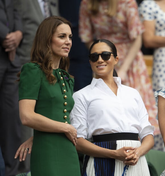 Catherine (Kate) Middleton, duchesse de Cambridge, Meghan Markle, duchesse de Sussex, et Pippa Middleton dans les tribunes lors de la finale femme de Wimbledon "Serena Williams - Simona Halep (2/6 - 2/6) à Londres, le 13 juillet 2019. 