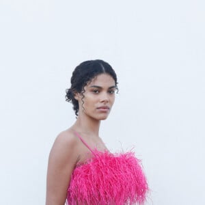 Tina Kunakey - Les célébrités au photocall du défilé Jacquemus pour la présentatation de la toute dernière collection "Le Raphia" au Bourget, Seine-Saint-Denis (93), France, le 12 décembre 2022. Habitué à ne pas suivre le calendrier de la Fashion Week de Paris, le designer a présenté sa toute dernière collection "Le Raphia" avec l'une une de ses couleurs favorites : le beige. © Veeren-Clovis/Bestimage 