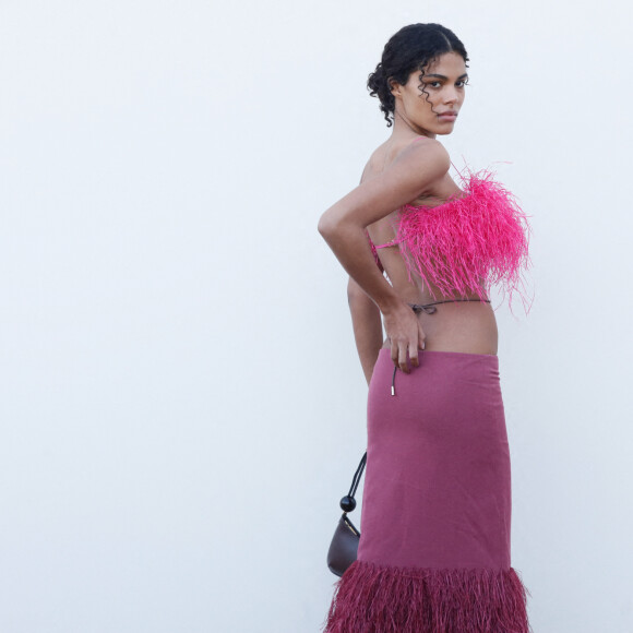 Tina Kunakey - Les célébrités au photocall du défilé Jacquemus pour la présentatation de la toute dernière collection "Le Raphia" au Bourget, Seine-Saint-Denis (93), France, le 12 décembre 2022. Habitué à ne pas suivre le calendrier de la Fashion Week de Paris, le designer a présenté sa toute dernière collection "Le Raphia" avec l'une une de ses couleurs favorites : le beige. © Veeren-Clovis/Bestimage 