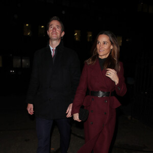 Pippa Middleton et son mari James Matthew à la sortie d'un concert à l'église St-Luke à Londres, le 1er décembre 2022. 