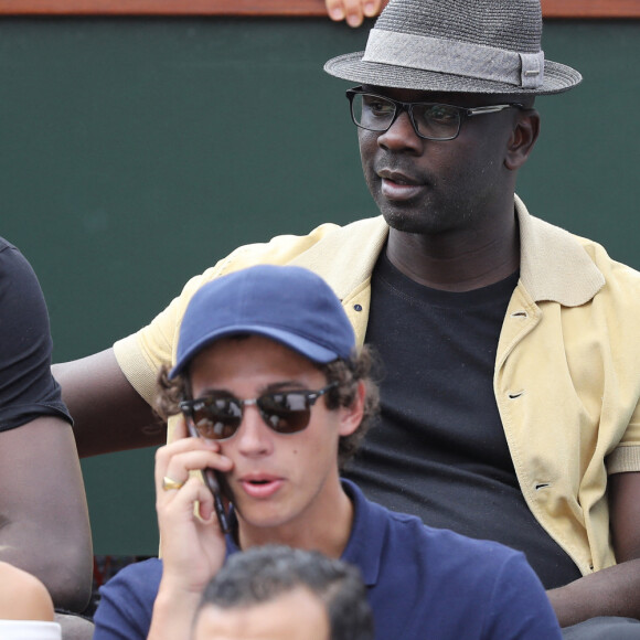 Lilian Thuram et son fils Marcus - People dans les tribunes des Internationaux de France de Tennis de Roland Garros à Paris le 2 juin 2018. © Dominique Jacovides-Cyril Moreau / Bestimage