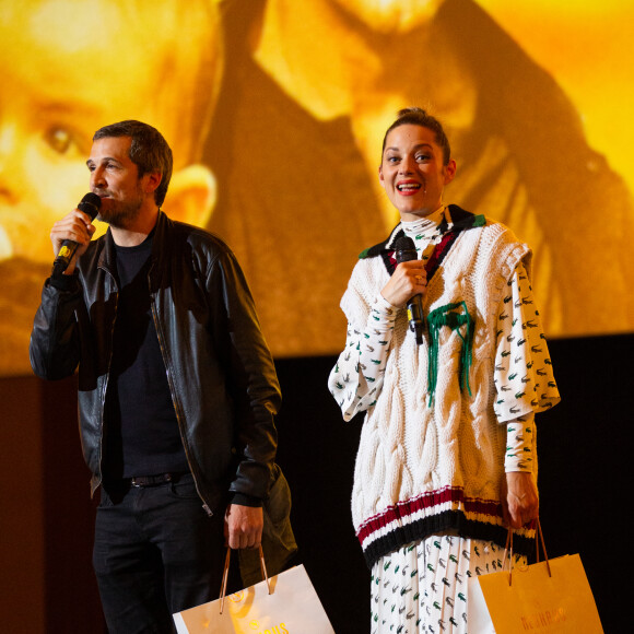 Marion Cotillard et son compagnon Guillaume Canet lors de l'avant-première du film "Nous finirons ensemble" au cinéma UGC Brouckère à Bruxelles, Belgique, le 23 avril 2019. © Alain Rolland/ImageBuzz/Bestimage