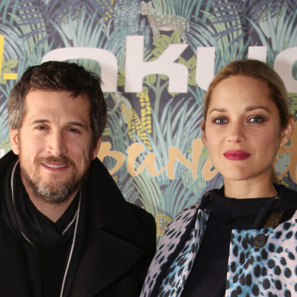 Exclusif - Guillaume Canet et sa compagne Marion Cotillard - Dîner de gala de la fondation Akuo suivi d'un concert privé de M.Chedid avec le collectif LAMOMALI au cabaret Lido, à Paris, France, le 17 janvier 2018. La Fondation Akuo entreprend et soutient des projets de développement durable sociaux et environnementaux.Elle offre à ses partenaires la possibilité de s'engager à ses côtés, en faveur de populations défavorisées en France et dans le monde entier. La mission de la Fondation Akuo se décline en 4 domaines d'intervention: donner accès à des sources d'énergies renouvelables continues et durablement compétitives, donner accès à l'éducation et à la connaissance, donner accès à l'eau et aux services de santé et préserver l'environnement et la biodiversité. © Denis Guignebourg/Bestimage 