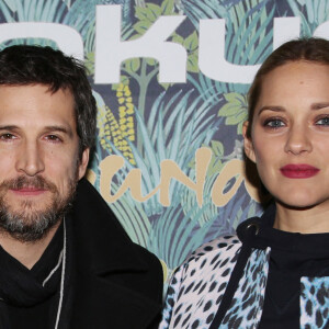 Exclusif - Guillaume Canet et sa compagne Marion Cotillard - Dîner de gala de la fondation Akuo suivi d'un concert privé de M.Chedid avec le collectif LAMOMALI au cabaret Lido, à Paris, France, le 17 janvier 2018. La Fondation Akuo entreprend et soutient des projets de développement durable sociaux et environnementaux.Elle offre à ses partenaires la possibilité de s'engager à ses côtés, en faveur de populations défavorisées en France et dans le monde entier. La mission de la Fondation Akuo se décline en 4 domaines d'intervention: donner accès à des sources d'énergies renouvelables continues et durablement compétitives, donner accès à l'éducation et à la connaissance, donner accès à l'eau et aux services de santé et préserver l'environnement et la biodiversité. © Denis Guignebourg/Bestimage