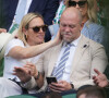 Zara Phillips et Mike Tindall assistent au tournoi de tennis de Wimbledon à Londres, le 28 juin 2022.