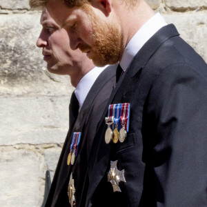 Le prince Harry, duc de Sussex, le prince William, duc de Cambridge - Arrivées aux funérailles du prince Philip, duc d'Edimbourg à la chapelle Saint-Georges du château de Windsor, le 17 avril 2021. 