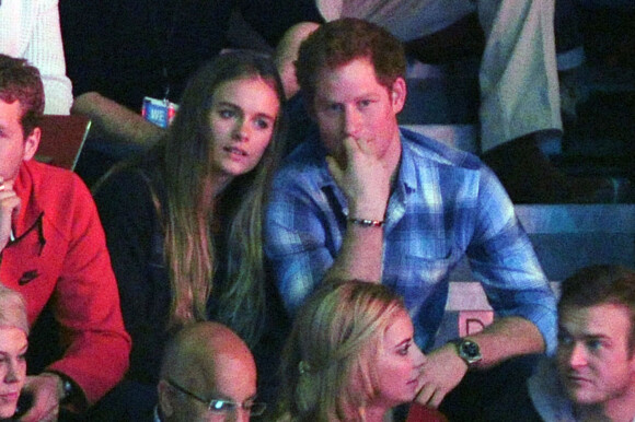 Le prince Harry et sa compagne Cressida Bonas dans les tribunes du stade de Wembley lors de l'évènement "We Day UK" à Londres. Le 7 mars 2014 