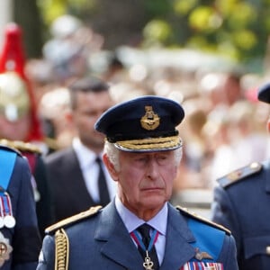 Le roi Charles III d'Angleterre, la princesse Anne et le prince William, prince de Galles, le prince Harry, duc de Sussex - Procession cérémonielle du cercueil de la reine Elisabeth II du palais de Buckingham à Westminster Hall à Londres, Royaume Uni, le 14 septembre 2022. 