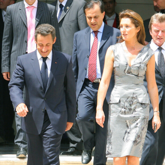 Jeanne-Marie Martin, Bernard Kouchner, Nicolas Sarkozy et son épouse de l'époque Cécilia à l'hôtel Marigny en 2006