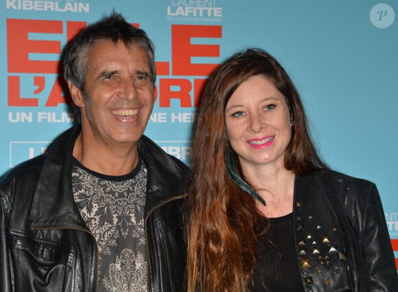Et il est marié depuis 2012 à Hélène Grémillon.
Julien Clerc et sa femme Hélène Grémillon - Avant-première du film "Elle l'adore" au cinéma UGC Normandie à Paris, le 15 septembre 2014.