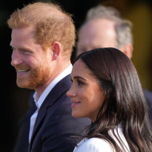 Le couple serait "abasourdi" par la nouvelle d'après des révélations de proches des Sussex à leur ami et expert royal Omid Scobie
Le prince Harry et Meghan Markle assistent à une réception organisée par la ville de La Haye et le ministère néerlandais de la Défense, au Nations Home, la veille de l'ouverture des Invictus Games 2020 à Zuiderpark, La Haye, le 15 avril 2022. 