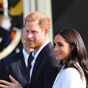 Le prince Harry, duc de Sussex, et Meghan Markle, duchesse de Sussex assistent à un engagement à la veille des Jeux Invictus 2020 aux Pays-Bas, à La Haye, le 15 avril 2022. 