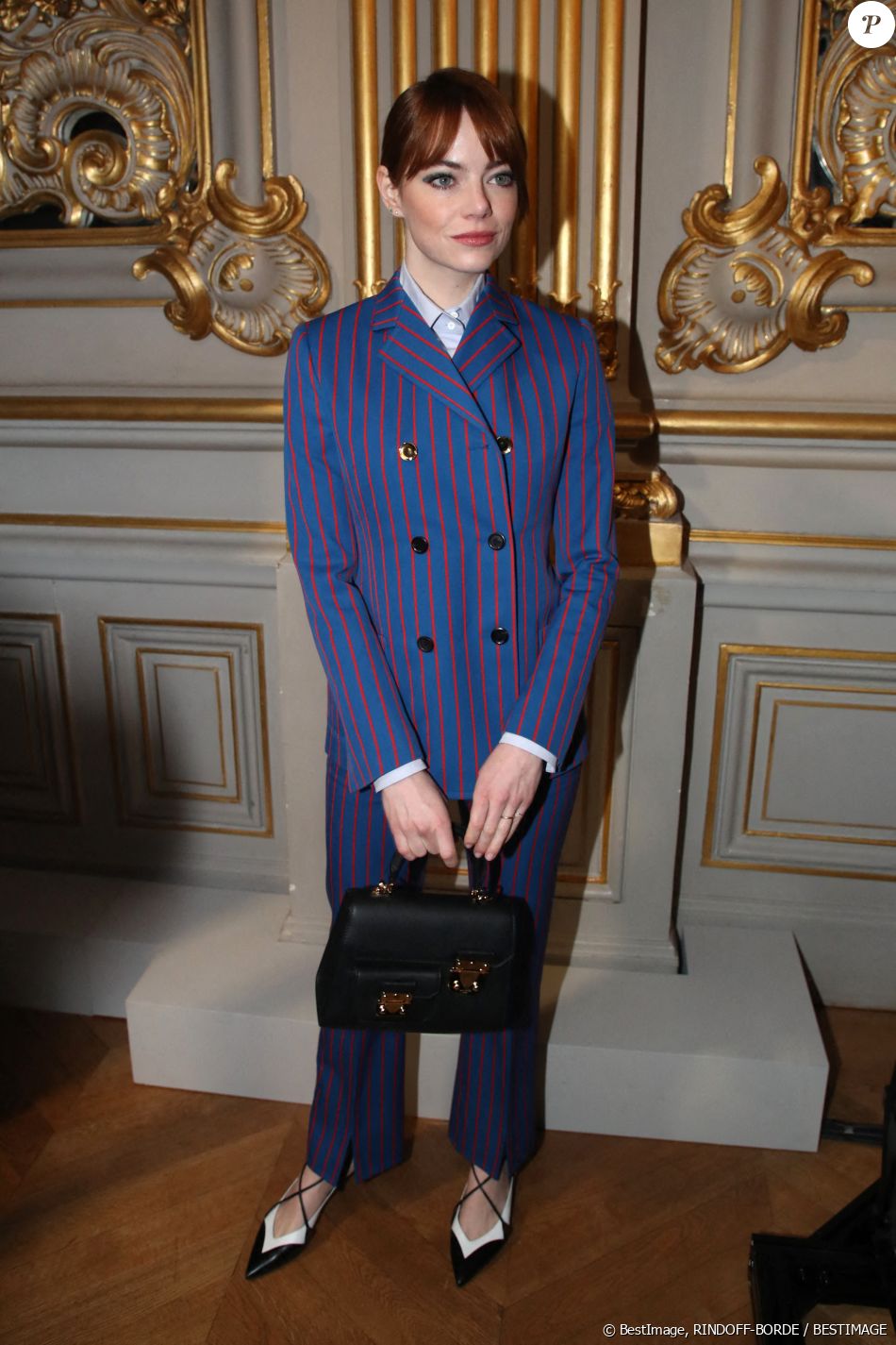Emma Stone Suits Up in Striped Blazer at Louis Vuitton's PFW Show