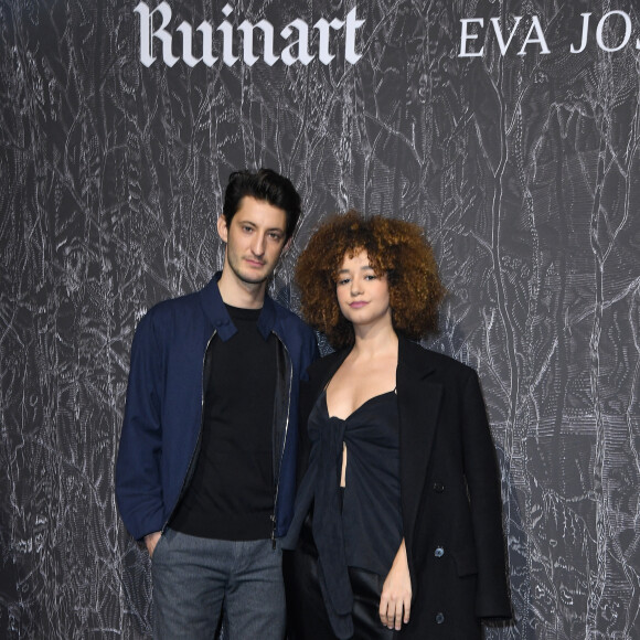 Pierre Niney et Lena Situations (Lena Mahouf) - Vernissage de l'exposition Ruinart "Promenade en Champagne" au Carreau du Temple à Paris. Le 9 mars 2023 © Giancarlo Gorassini / Bestimage