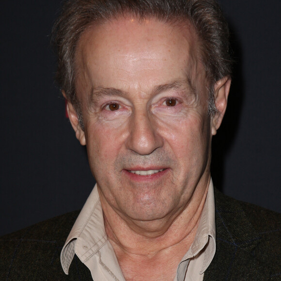 Gerard Klein pose pour le lancement de la nouvelle jaguar F-Type à Paris a L'atrium Banque. France le 31 Janvier 2013