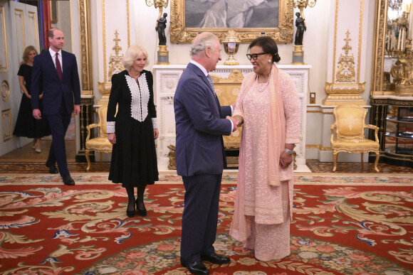 Le prince William de Galles, le roi Charles III d'Angleterre et la reine consort Camilla Parker Bowles lors de la réception pour la journée du Commonwealth au palais de Buckingham à Londres. Le 13 mars 2023 