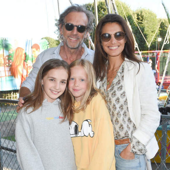 Stéphane Freiss, sa femme Ursula Freiss et leur fille Bianca, guest - Soirée d'inauguration de la 35ème fête foraine des Tuileries au Jardin des Tuileries à Paris, le 22 juin 2018. © Coadic Guirec/Baldini/Bestimage 
