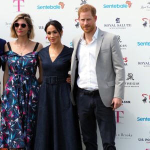 Le prince Harry, duc de Sussex et Meghan Markle, la Duchesse de Sussex arrivent à la Royal Berkshire Polo Cup où le Duc participe aujourd'hui à la Coupe ISP Hanz de Sentebale à Windsor au Royaume-Uni, le 26 juillet 2018. 