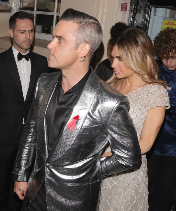 Robbie Williams et sa femme Ayda Field Williams à la sortie du gala caritatif de la comédie musicale "Take That The Band" au profit de la Fondation Elton John contre le sida, au théâtre Royal Haymarketau Theatre Royal Haymarket à Londres, Royaume Uni, le 4 décembre 2018. 