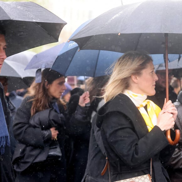 Benjamin Griveaux et sa femme Julia Minkowski - Arrivées aux obsèques de l'avocat Hervé Temime au cimetière du Montparnasse à Paris, France, le 14 avril 2023. © Clovis-Jacovides/Bestimage  Funeral service of French lawyer Herve Temime at the Montparnasse cemetery in Paris, France, on April 14, 2023. 