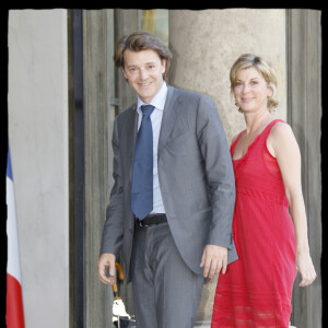 François Baroin et Michèle Laroque - Cérémonie de remise de décorations au palais de l'Elysée le 30 juin 2009