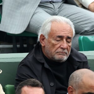 Dominique Strauss Kahn (DSK) et sa compagne Myriam L'Aouffir dans les tribunes de la finale homme des internationaux de France de Roland Garros à Paris le 5 juin 2016. © Moreau-Jacovides / Bestimage