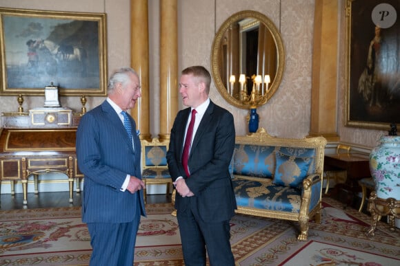 Le roi Charles III d'Angleterre, reçoit le Premier ministre de Nouvelle-Zélande, Chris Hipkins au palais de Buckingham à Londres, le 3 mai 2023. 