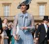 Une tenue qui avait dû subir quelques modifications afin d'être approuvée par le protocole. 
Catherine (Kate) Middleton, princesse de Galles lors d'une Garden Party au palais de Buckingham à Londres, Royaume Uni, le 9 mai 2023, pour célébrer le couronnement du roi et de la reine d'Angleterre. 