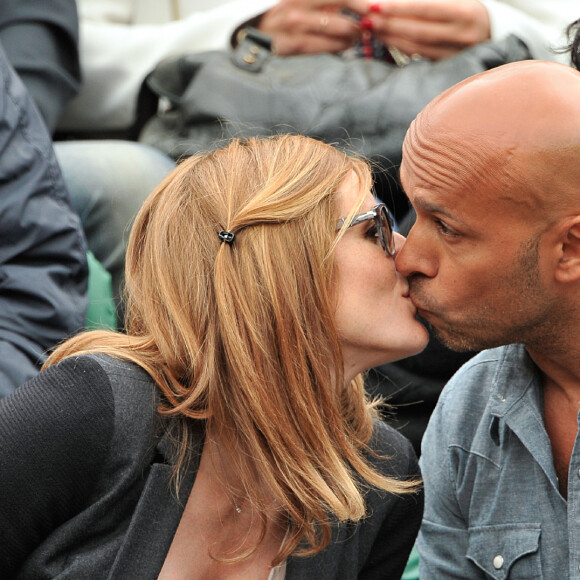 Eric Judor et sa compagne aux Internationaux de France de tennis de Roland Garros à Paris, le 29 mai 2014.