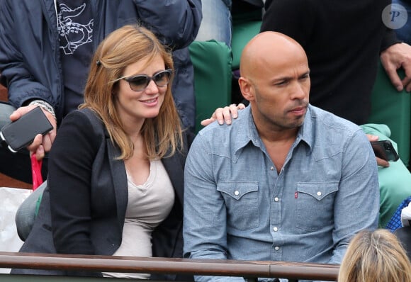 Eric Judor et sa compagne enceinte aux Internationaux de France de tennis de Roland Garros à Paris, le 29 mai 2014.