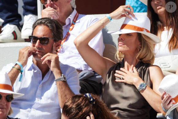 Sylvie Tellier et son mari Laurent Schenten en tribunes lors des Internationaux de France de tennis de Roland Garros 2023 à Paris, France, le 4 juin 2023. © Cyril Moreau/Bestimage