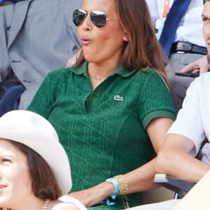 La chanteuse Nâdiya et son fils Yanis en tribunes lors des Internationaux de France de tennis de Roland Garros 2023, à Paris, France, le 9 juin 2023. © Jacovides-Moreau/Bestimage 