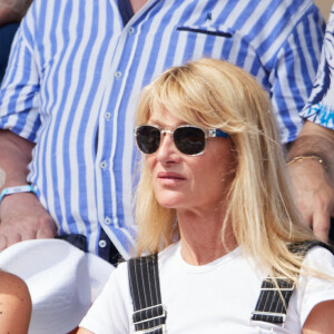 Isabelle Camus et Joalukas Noah en tribunes lors des Internationaux de France de tennis de Roland Garros 2023, à Paris, France, le 9 juin 2023. © Jacovides-Moreau/Bestimage  People in the stands during the Roland Garros International Tennis Championships in Paris, France, on June 9th, 2023. 