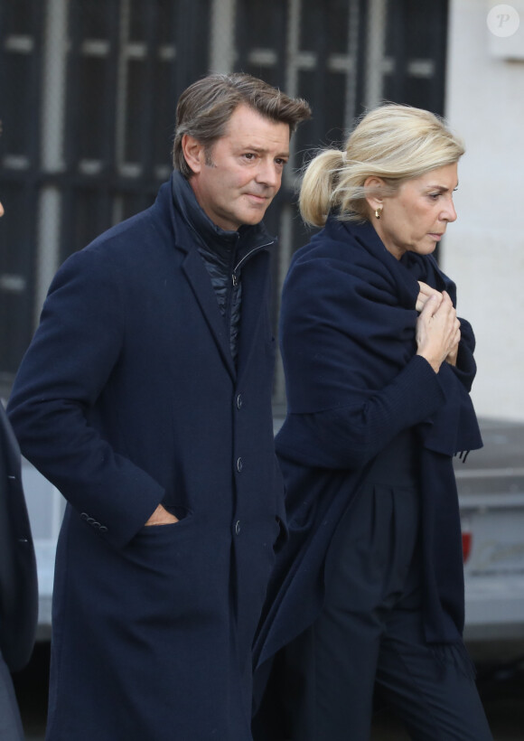 François Baroin et sa compagne Michèle Laroque - Arrivées en l'église Saint-Sulpice pour les obsèques de l'ancien président de la République Jacques Chirac à Paris. Un service solennel sera présidé par le président de la République. © Dominique Jacovides / Bestimage