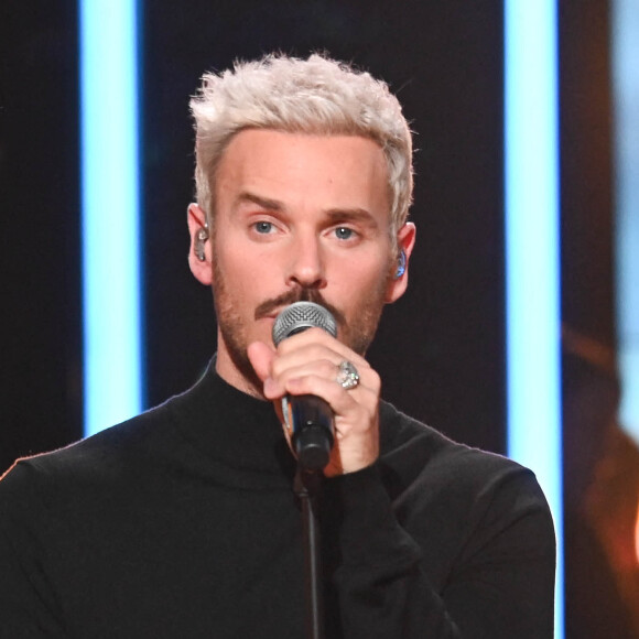 Il doit donner un concert ce soir mais tout ne se déroule pas comme prévu.
M. Pokora - Les personnalités se mobilisent lors de la 36ème édition du Téléthon sur le plateau de France 2, avec pour parrain K.Adams. © Coadic GUIREC / Bestimage