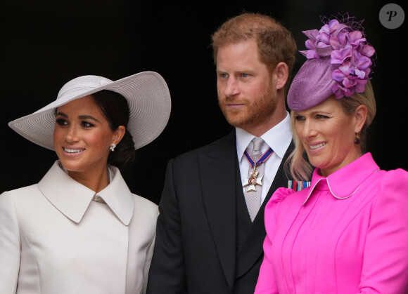 Allant jusqu'à taxer le duc et la duchesse "d'arnaqueurs" 
Le prince Harry, duc de Sussex, Meghan Markle, duchesse de Sussex, et Zara Phillips (Zara Tindall) - Les membres de la famille royale et les invités à la sortie de la messe du jubilé, célébrée à la cathédrale Saint-Paul de Londres, Royaume Uni, le 3 juin 2022. 