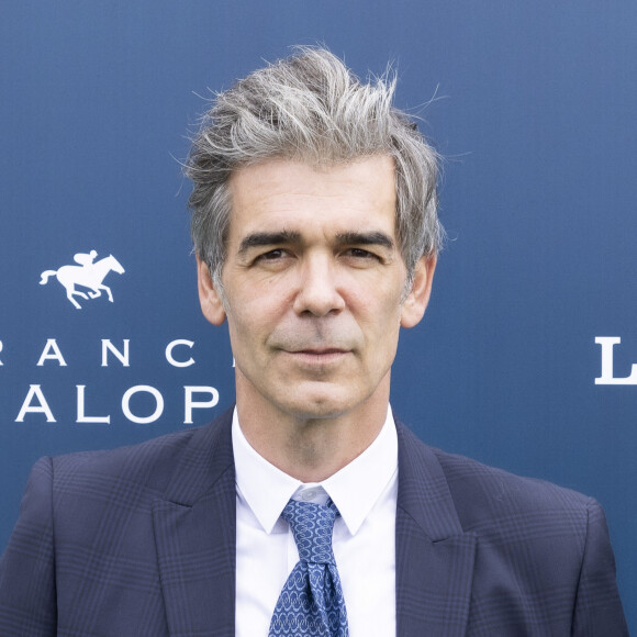 Toutefois, il sera toujours à la tête du 19.45 à la rentrée. L'occasion pour lui de révéler l'identité de sa remplaçante.
Xavier de Moulins rejoint RTL à la rentrée - Xavier De Moulins - Photocall du Prix de Diane Longines 2022 à Chantilly le 19 juin 2022. © Jack Tribeca / Bestimage