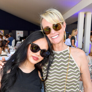 Exclusif - Laeticia Hallyday et sa fille Joy dans l'Espace VIP lors de la 9ème édition du "Longines Paris Eiffel Jumping" au Champ de Mars à Paris, France, le 25 juin 2023. © Perusseau-Veeren/Bestimage 