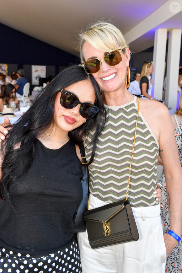 Exclusif - Laeticia Hallyday et sa fille Joy dans l'Espace VIP lors de la 9ème édition du "Longines Paris Eiffel Jumping" au Champ de Mars à Paris, France, le 25 juin 2023. © Perusseau-Veeren/Bestimage 